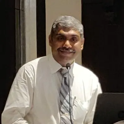 Dr. Alfred J Augustine